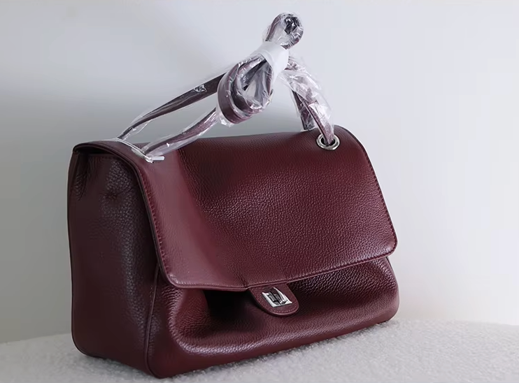 The Turn-Lock Crossbody