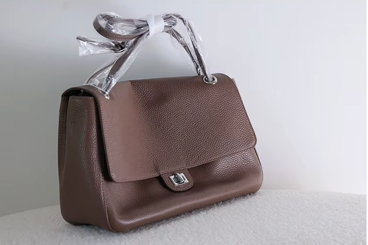 The Turn-Lock Crossbody