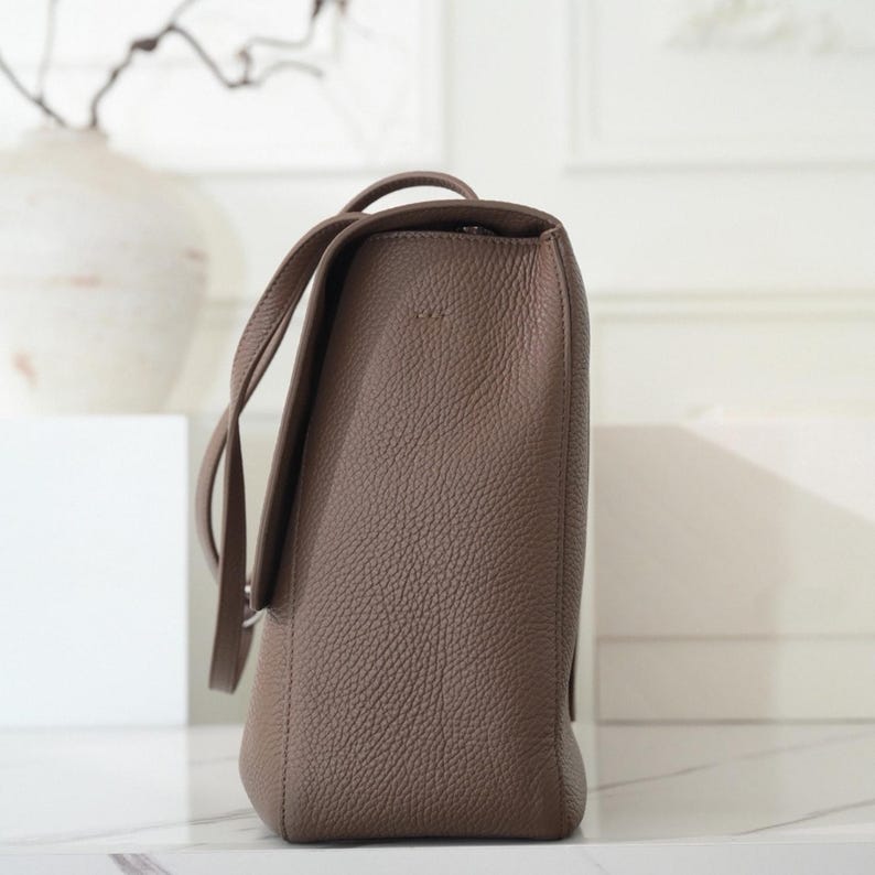 The Turn-Lock Crossbody