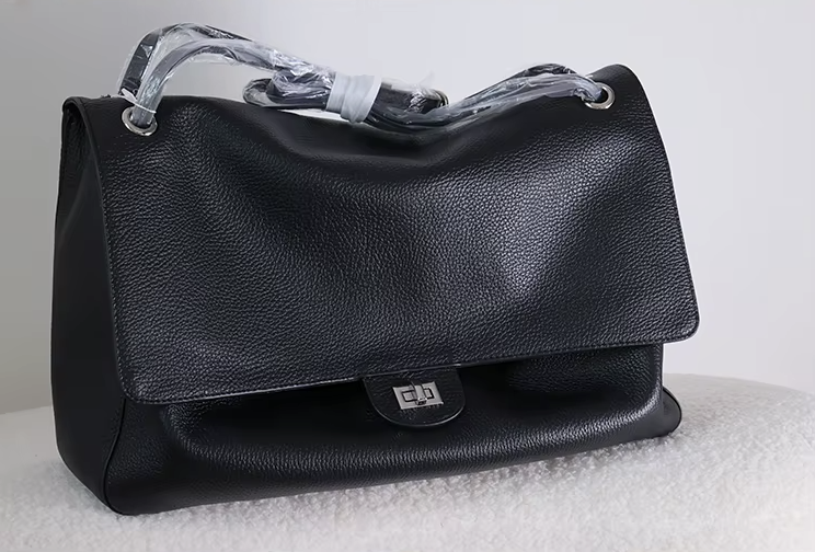 The Turn-Lock Crossbody