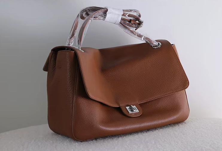The Turn-Lock Crossbody