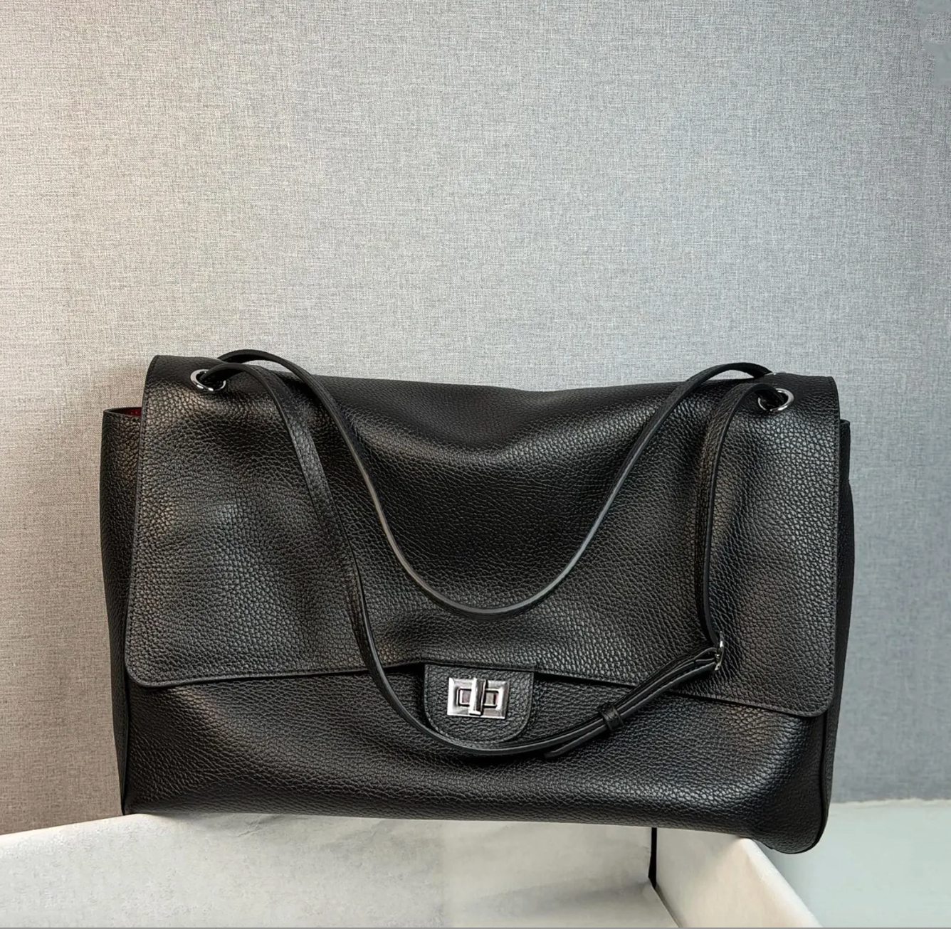 The Turn-Lock Crossbody