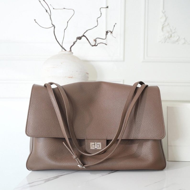 The Turn-Lock Crossbody