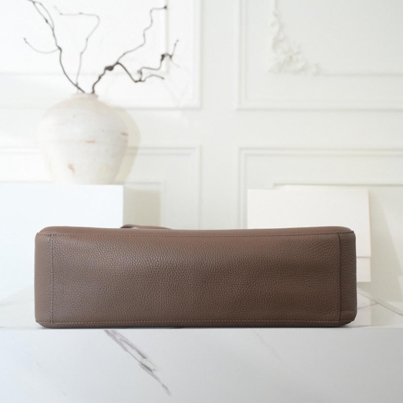 The Turn-Lock Crossbody