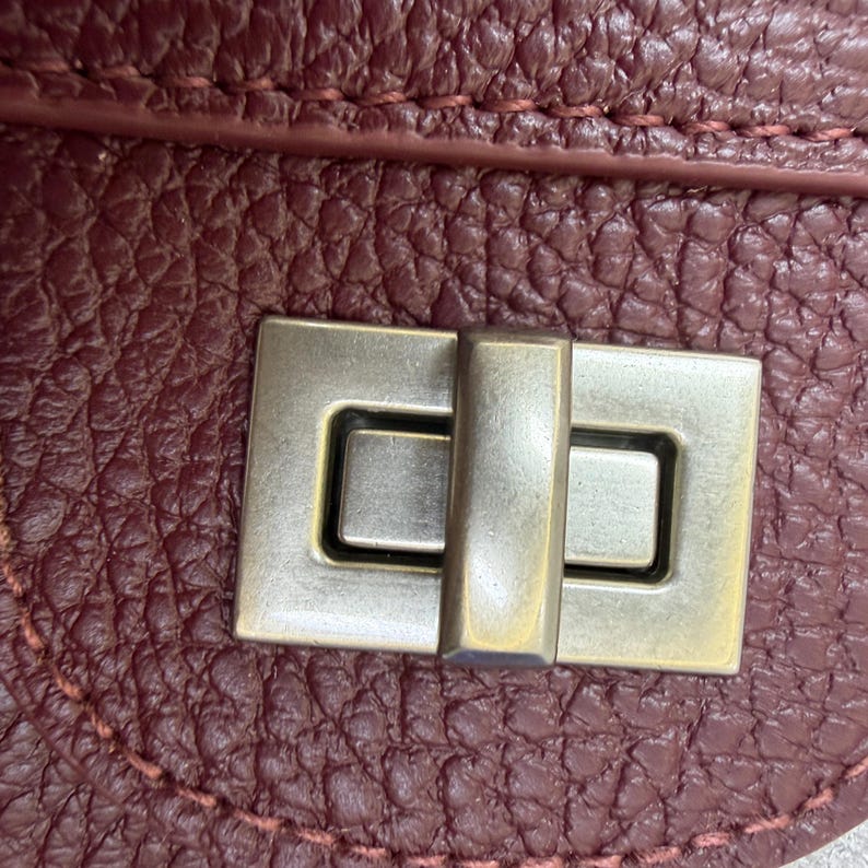 The Turn-Lock Crossbody